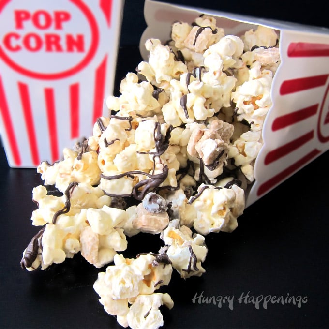 S'mores Popcorn filled with chocolate chips, mini graham crackers, and tiny marshmallows.