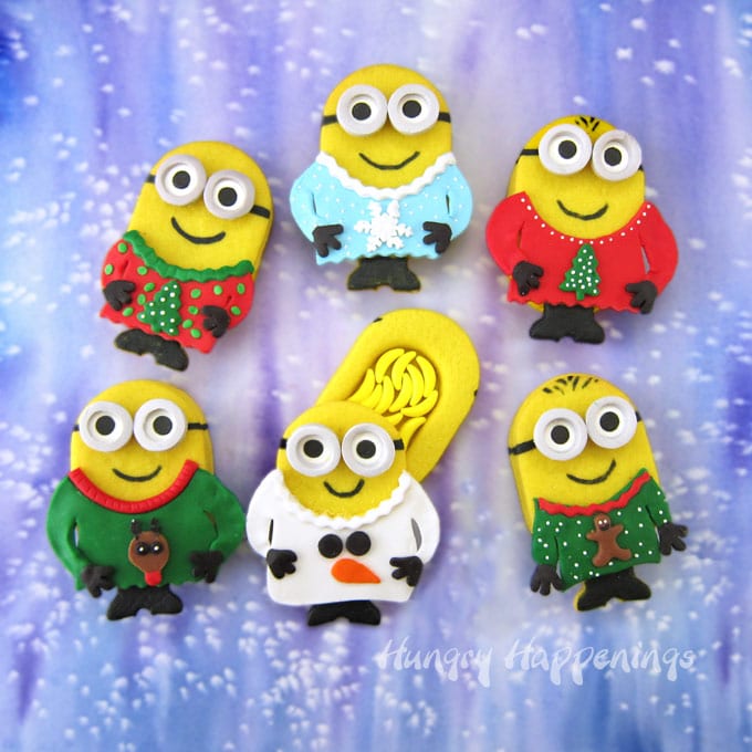 Minion Christmas Piñata Cookies dressed in Ugly Christmas Sweaters