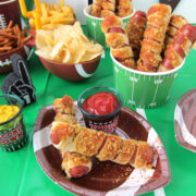 pretzel dogs served on a football themed tablescape.