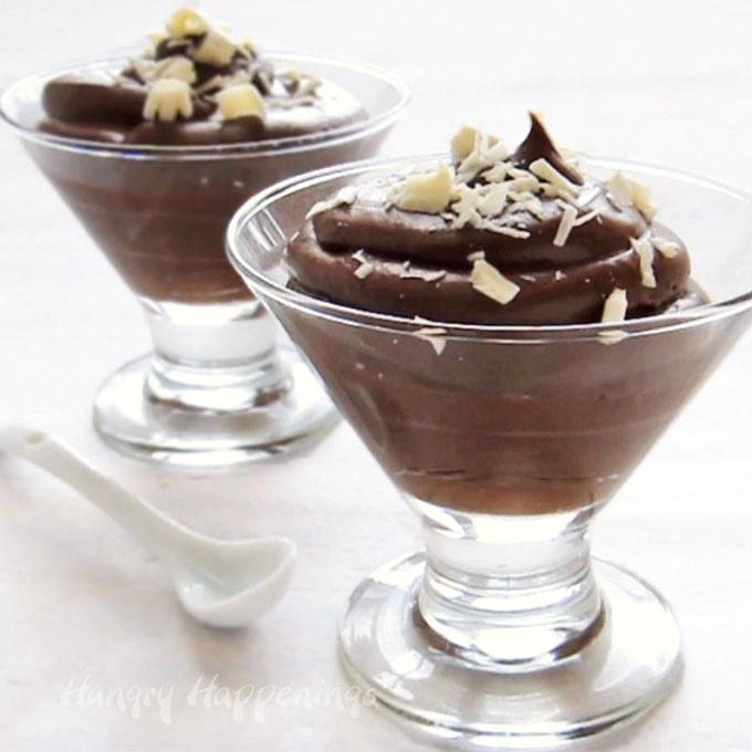 The BEST Chocolate Mousse Recipe served in dessert cups topped with white chocolate shavings.