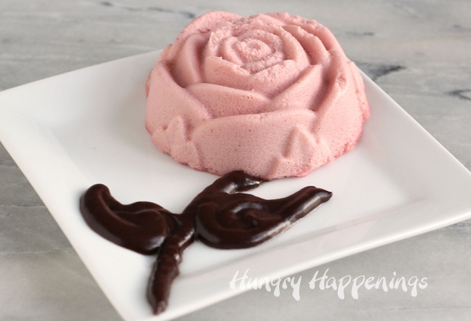 Cheesecake roses infused with raspberry puree with chocolate ganache stems and leaves are nice for Mother's Day.