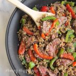 Knorr One Skillet Meals Steak and Peppers with Brown Rice and Quinoa cooked in a skillet.