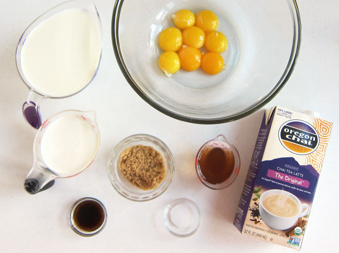 ingredients to make bread pudding including milk, heavy whipping cream, vanilla bean paste, brown sugar, salt, and Oregon Chai Tea Latte Concentrate