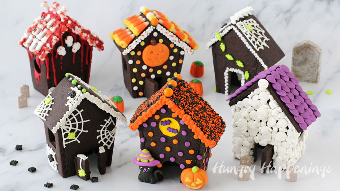 six different Halloween cookie house designs - bloody bones, polka dots, bugs, spider webs, bats, and skulls