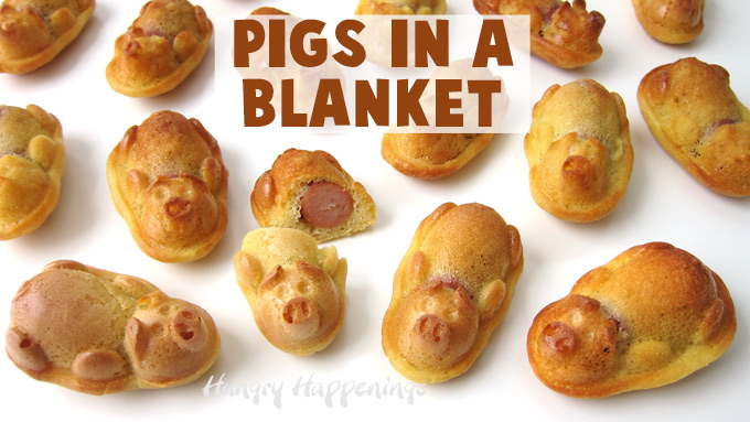 Pig-shaped pigs in a blanket made using pancake batter baked around Little Smokies.