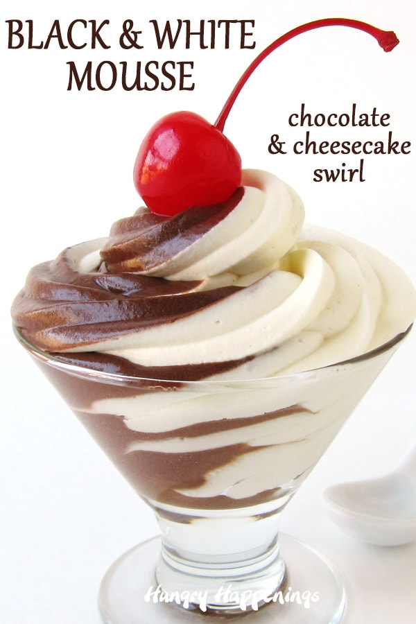 black and white chocolate cheesecake mousse is swirled in a clear dessert cup 