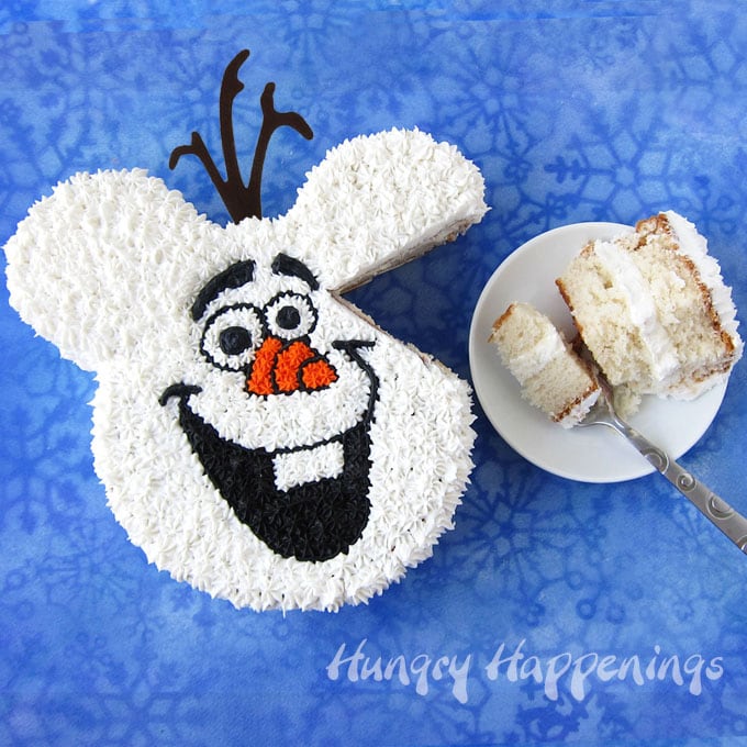Cut a slice out of this cute Olaf Mickey Cake to serve to your Frozen birthday party guests. It's moist and tender and delicious. 