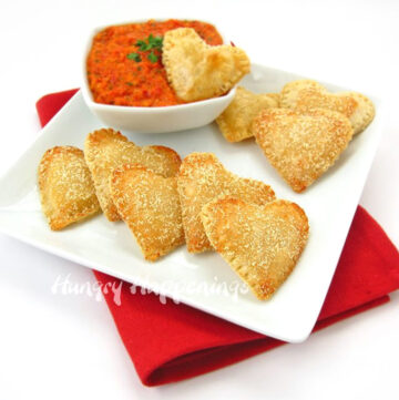 mozzarella cheese filled pie crust hearts served with roasted red pepper dip