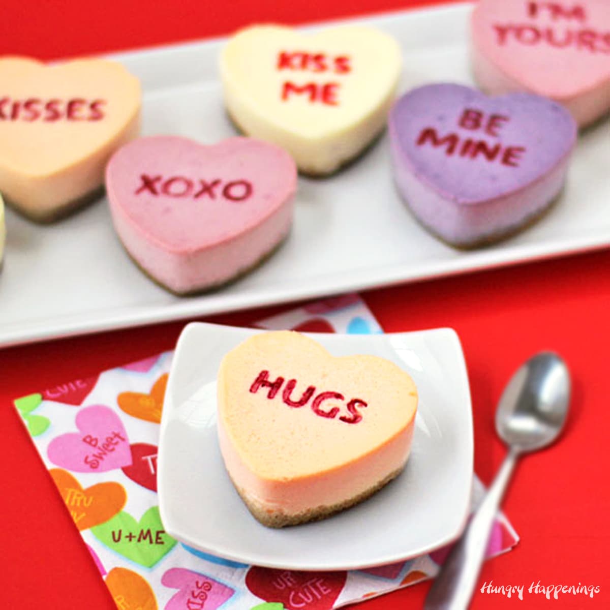 naturally colored conversation heart cheesecakes with sweet Valentine's Day messages. 