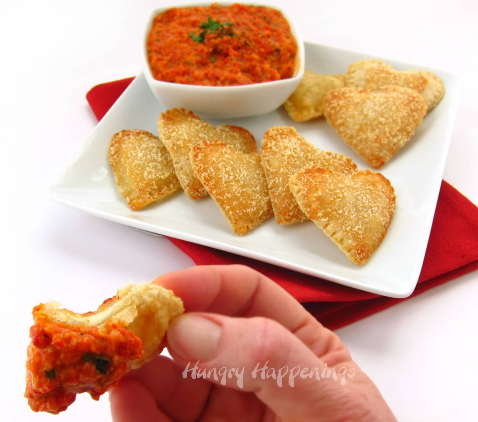 mozzarella cheese-filled pastries served with roasted red pepper pesto 