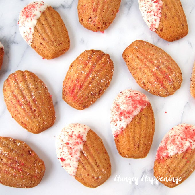 strawberry madeleines with some sprinkled with crushed freeze-dried strawberries and some dipped in white chocolate