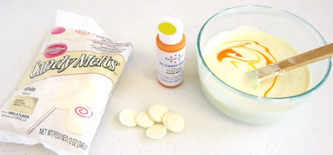 Color white candy melts using yellow oil-based candy coloring.