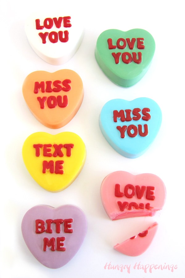 brightly colored white chocolate conversation heart truffles filled with colorful white chocolate ganache