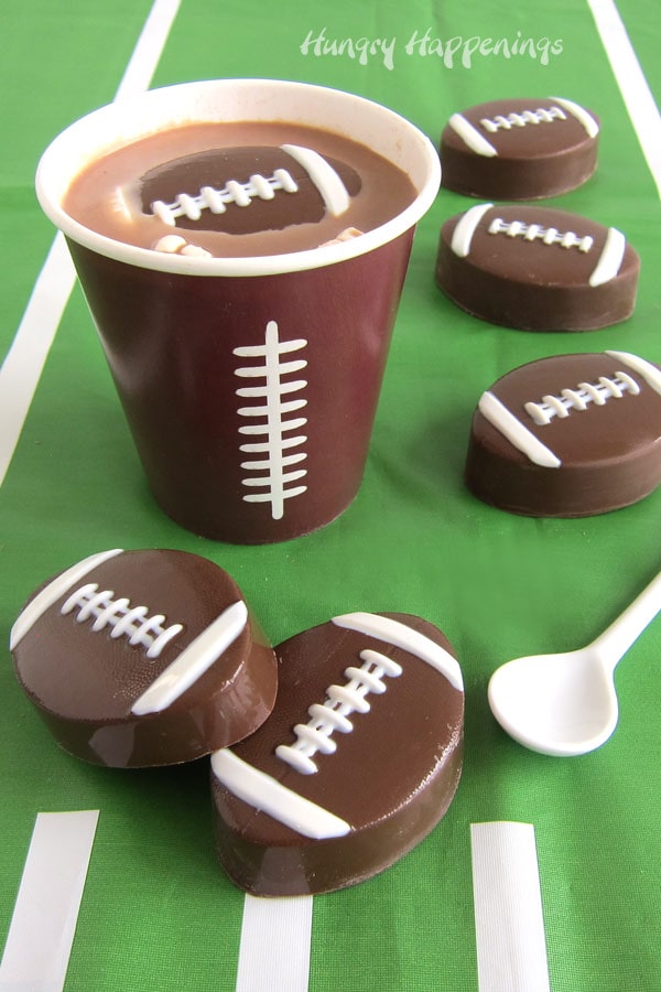 Milk chocolate football hot chocolate bombs dropped into hot milk make delicious hot cocoa.
