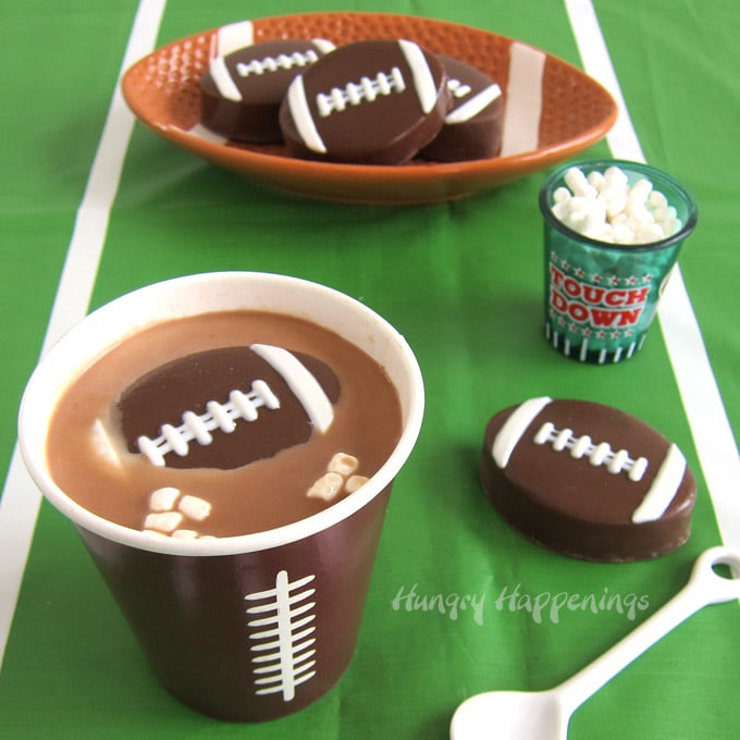 Football Hot Chocolate Bombs filled with hot cocoa mix and tiny marshmallows