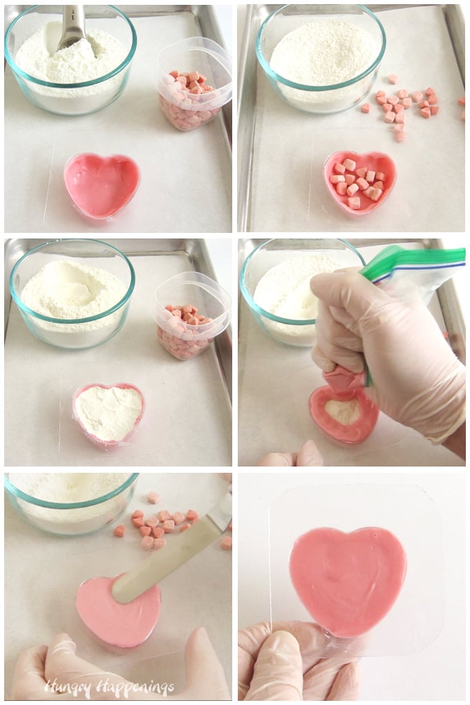 Fill heart-shaped chocolate shell with pink marshmallows and white hot chocolate mix then cover with pink candy melts and freeze until hardened