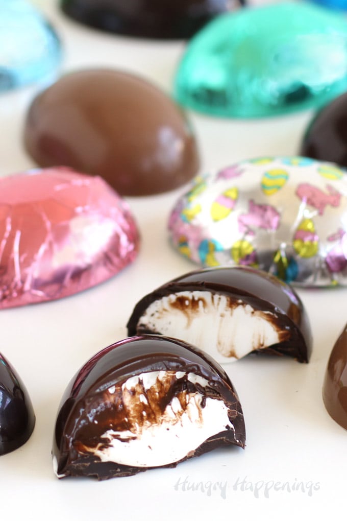Marshmallow Eggs - dark chocolate and milk chocolate eggs filled with marshmallow creme are wrapped in colorful Easter foil.