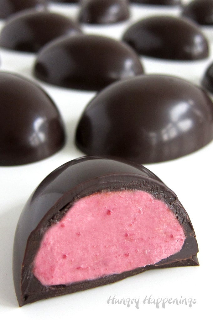 Chocolate Raspberry Eggs filled with raspberry infused white chocolate ganache.