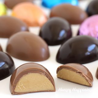 Peanut butter fudge filled chocolate eggs in milk and dark chocolate wrapped in brightly colored foil wrappers.