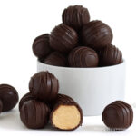 4-ingredient peanut butter fudge balls coated in chocolate