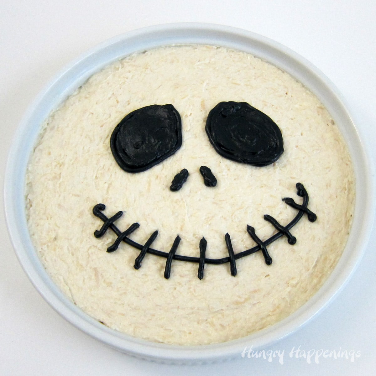 Jack Skellington Dip - chicken dip decorated with black-colored cream cheese