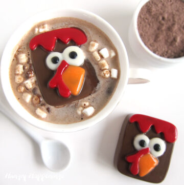 Turkey hot chocolate bombs melting in a coffee mug.