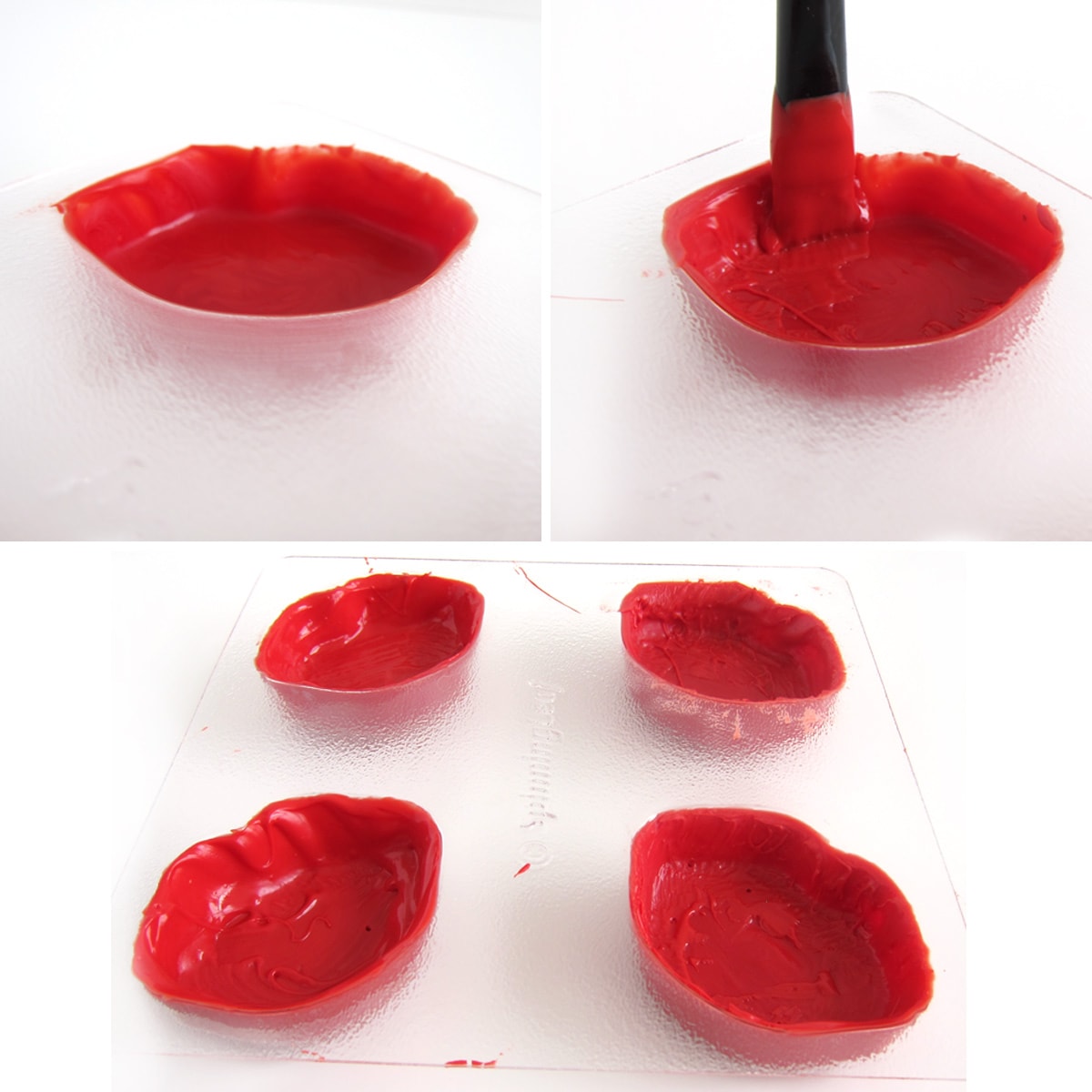 painting a second layer of red candy melts into a lips candy mold