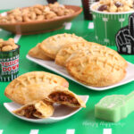 pulled pork-filled football-shaped pastry pockets