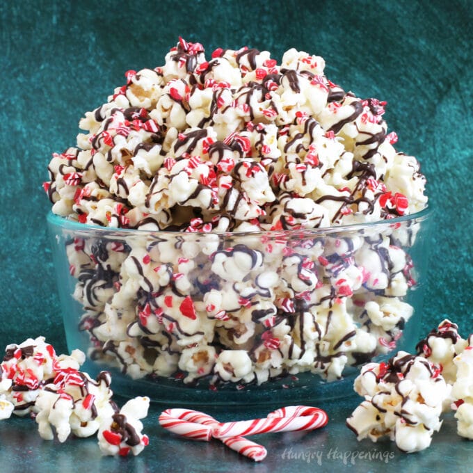 Candy Cane Popcorn coated in white chocolate, dark chocolate, and peppermint candies.
