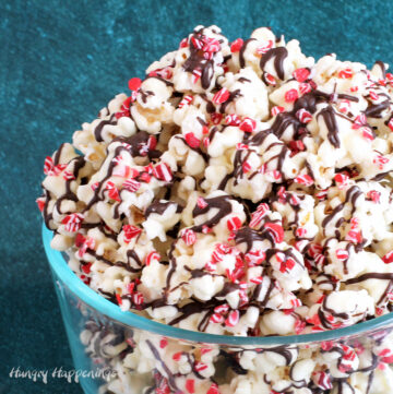 white chocolate peppermint popcorn topped with crushed candy canes