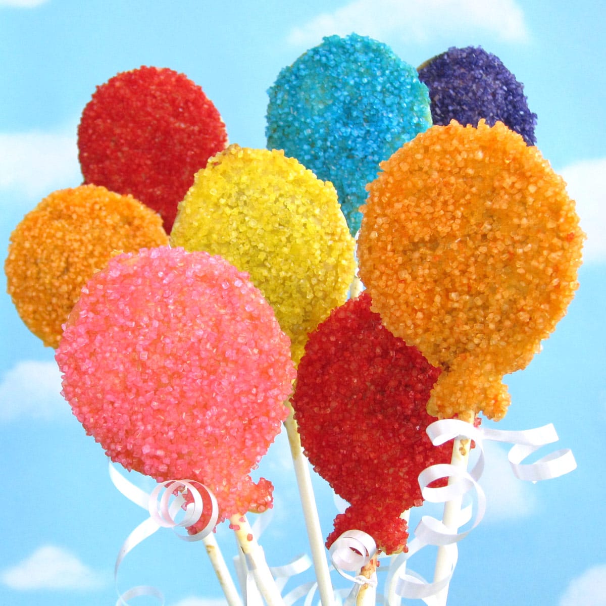 birthday balloon pastry lollipops decorated with brightly colored sugar