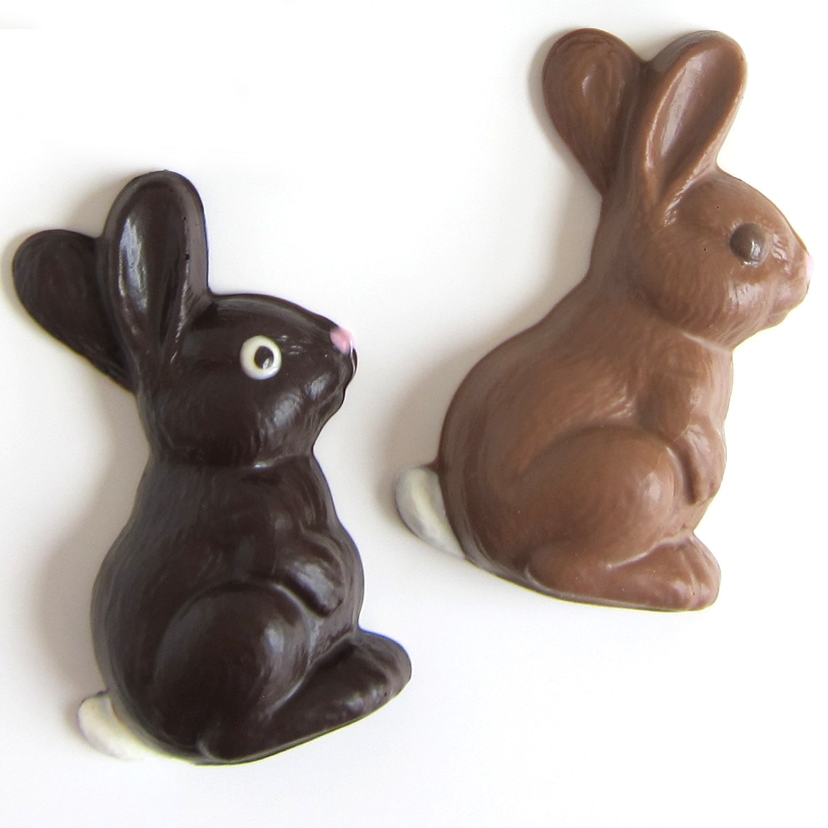 cute dark chocolate and milk chocolate side view Easter bunnies