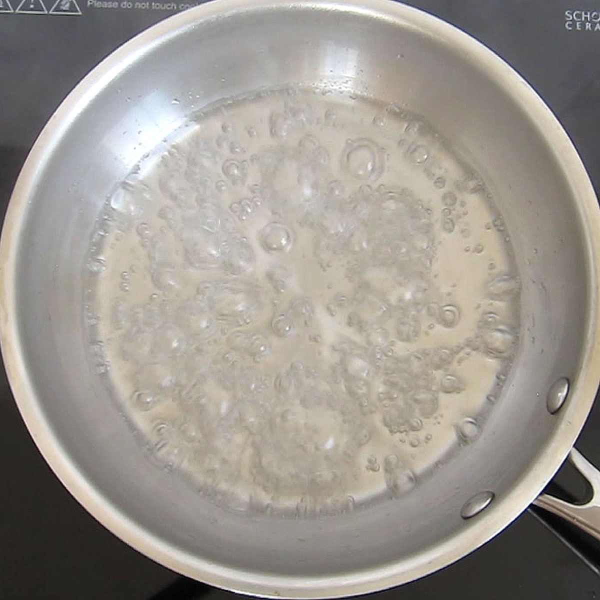 boiling sugar syrup in a skillet