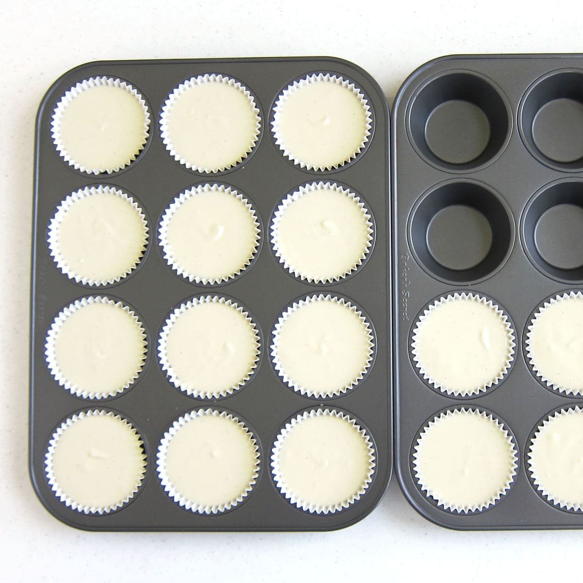 Cupcake liners filled with cheesecake filling.