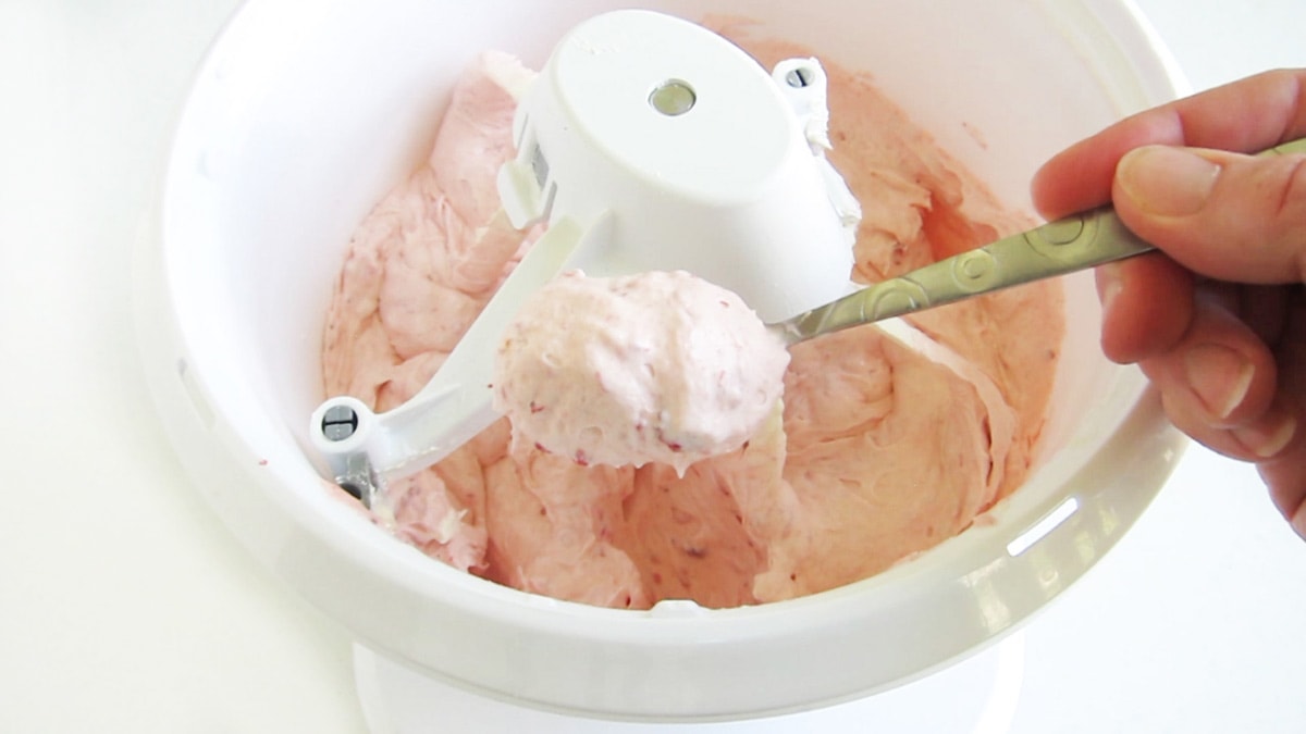 whipped strawberry frosting in a mixer.