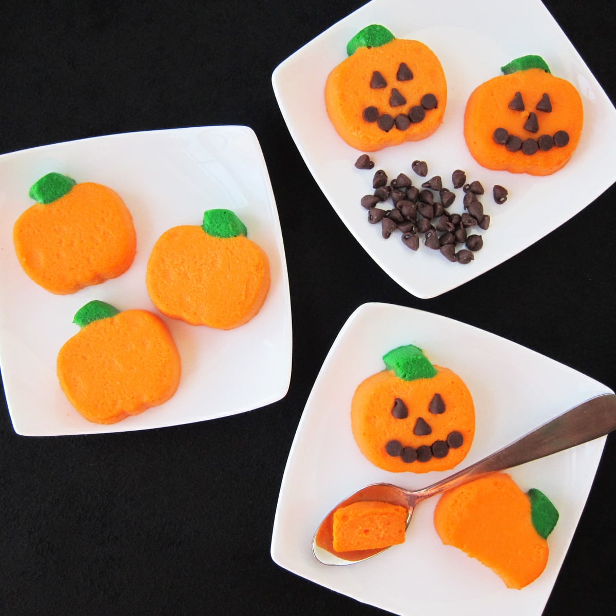 mini cheesecake pumpkins served plain or decorated to look like Jack-O-Lanterns with chocolate chip faces.