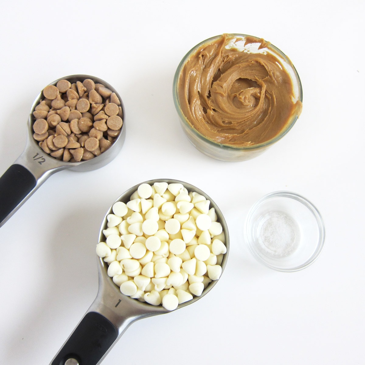 1 cup white chips, ½ cup peanut butter chips, bowl of peanut butter, and a tiny bowl of salt.