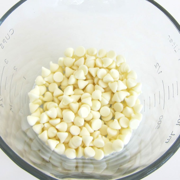 white chocolate chips in a mixing bowl.
