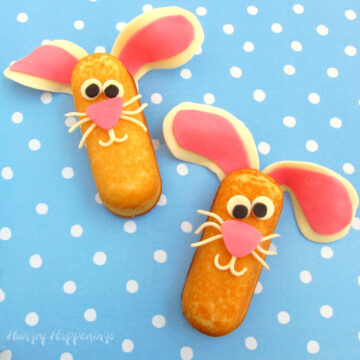 Twinkie Bunnies cute bunny cakes decorated with big floppy ears, cute eyes, and a pink nose.