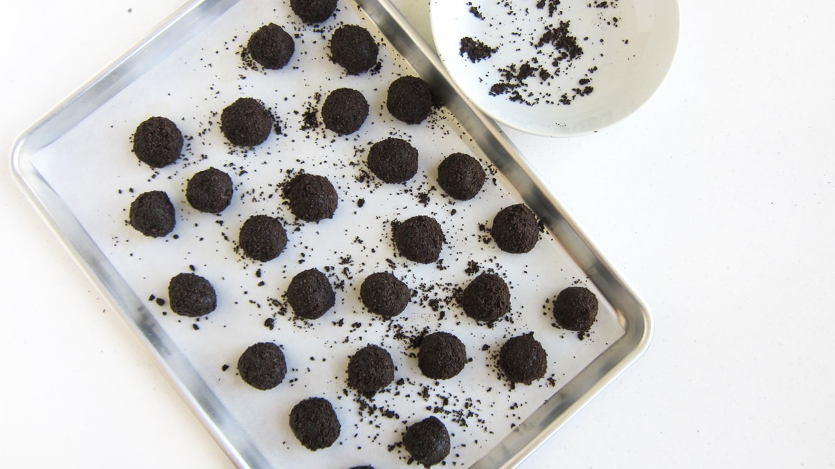 oreo cookie balls rolled in oreo cookie crumbs.